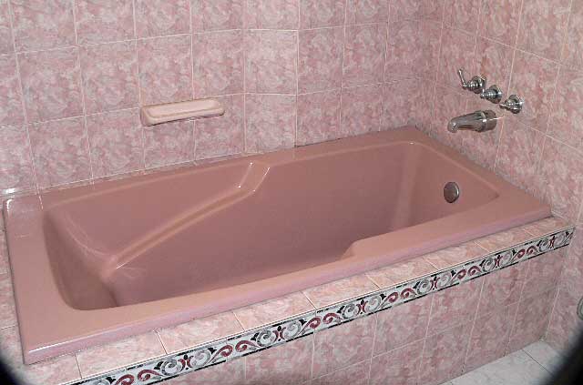 Bathroom Photo Example - bathroom in a with pink bath top