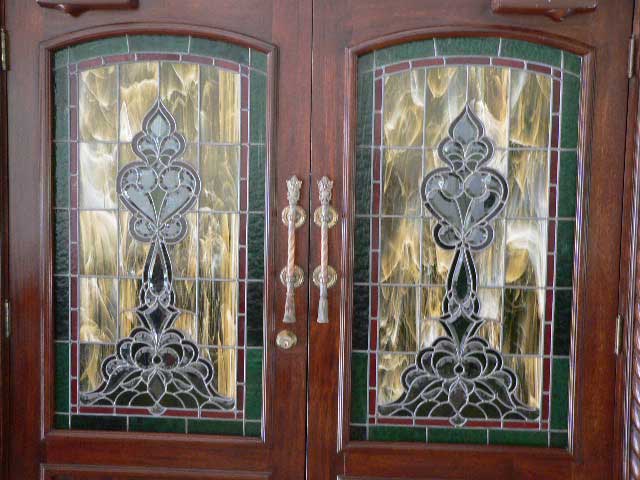 Door Photo Example - Beautiful decorative tiffany style glass decor in a brown wood door