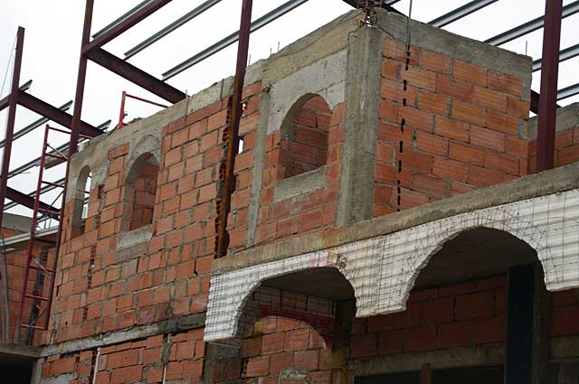 Example photo of a modern town house under construction