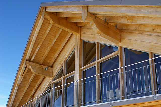 Example of a modern wood roof construction of a house in the Swiss alps